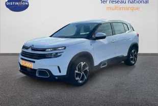 Citroën C5 Aircross blanc nacré en 3/4 avant droit, SUV hybride avec jantes bi-ton et détails noirs contrastants.