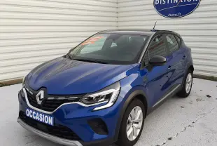 Renault Captur 1.5 Blue dCi 115ch Business 2020 bleu Iron avec toit noir, vue 3/4 avant droit, calandre et phares LED visibles.