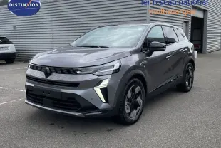 Renault Symbioz gris cassiopée métal en 3/4 avant droit, SUV hybride au design moderne avec feux LED distinctifs.