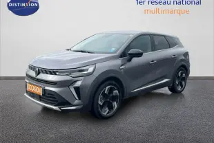 Renault Symbioz gris cassiopée métal en 3/4 avant droit, SUV hybride avec jantes modernes et calandre distinctive.