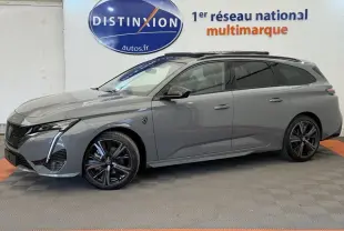Peugeot 308 Hybrid 136 e-DCS6 GT gris foncé vue de profil côté gauche, avec jantes noires et toit noir.