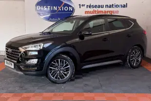 Hyundai Tucson noir 2019 en 3/4 avant gauche, avec jantes alliage et calandre chromée visible.