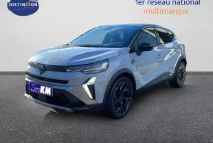 Renault Captur E-Tech hybride gris Rafale métal avec toit noir, vue 3/4 avant droit, jantes noires distinctives.