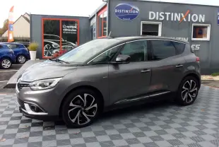 Renault Scenic IV 140 Bose gris Cassiope en vue 3/4 avant droit, jantes alliage noires et toit noir contrasté visible.
