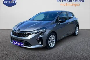 Renault Clio 2025 gris schiste métal vue 3/4 avant droit, avec calandre moderne et feux LED distinctifs.