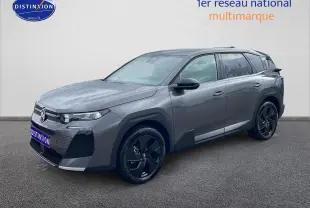 Vue 3/4 avant droite d’un Citroën C5 Aircross gris platinium avec jantes alliage noires et toit noir.