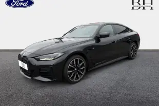 BMW Série 4 Gran Coupe 420iA M Sport en saphirschwarz métallisé vue 3/4 avant droit avec jantes sport noires.