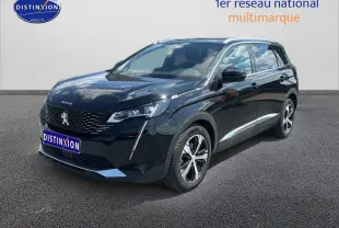 Peugeot 5008 noir métal vue 3/4 avant droit avec jantes alliage et calandre distinctive Peugeot.