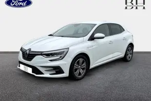 Renault Mégane blanc glacier vue 3/4 avant droit, avec feux LED et jantes alliage visibles.