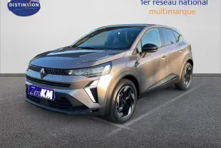 Renault Captur E-Tech hybride gris cassiopée métal vu en 3/4 avant droit avec jantes bi-ton noires.