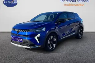 Renault Symbioz bleu Iron Metal en 3/4 avant droit, SUV hybride avec calandre distinctive et jantes stylisées.