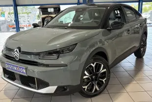 Citroën C4 vert Manhattan, vue 3/4 avant droit, toit noir bi-ton et jantes alliage 18 pouces visibles.