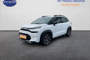 Citroën C3 Aircross blanc polaire en 3/4 avant droit, avec toit noir et jantes bi-ton visibles.