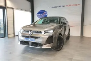 Citroën C5 Aircross gris métallisé vue 3/4 avant droit avec jantes noires et calandre noire brillante.