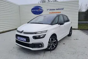 Citroën C4 Spacetourer blanc vue 3/4 avant droit, avec jantes alliage bicolores et calandre noire distinctive.