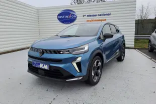 Vue avant d'une Renault Symbioz bleu mercure 2025 avec signature lumineuse verticale et calandre moderne.
