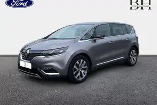 Renault Espace gris Cassiopée en vue 3/4 avant droit, mettant en valeur ses jantes alliage et lignes fluides.