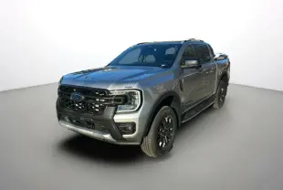 Ford Ranger 2026 gris iconic en 3/4 avant droit avec calandre noire et jantes alu noires.