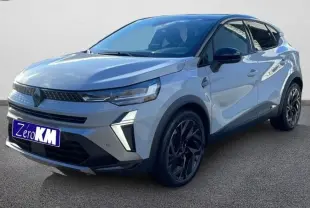 Renault Captur II Ph.2 blanc nacré en 3/4 avant droit, avec jantes noires et calandre moderne distinctive.