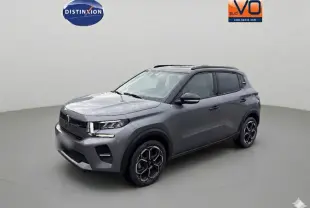 Citroën C3 Turbo 100 ch gris, vue 3/4 avant droit, avec barres de toit et jantes alliage 17 pouces.