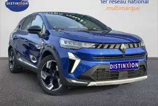 Renault Symbioz 1.6 E-Tech hybride bleu, vue 3/4 avant avec calandre distinctive et jantes noires et argentées.