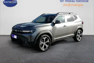SUV Dacia Duster gris schiste métal en 3/4 avant droit, avec jantes alliage et toit noir brillant.