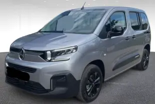 Citroën Berlingo Multispace gris Artense vu en 3/4 avant droit avec jantes noires et calandre moderne.