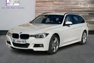 BMW Série 3 Touring F31 blanc vue 3/4 avant droit, avec jantes alliage et calandre noire M Sport visible