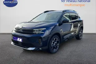 Citroën C5 Aircross bleu Eclipse Metal en 3/4 avant droit, avec jantes noires et toit noir contrasté.