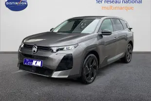 Citroën C5 Aircross Hybrid gris platinium métal en 3/4 avant droit avec jantes noires et calandre moderne.