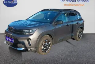 Citroën C5 Aircross gris platinium métal en 3/4 avant droit avec jantes noires et toit noir contrasté.