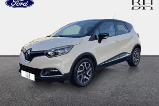 Renault Captur beige cendré avec toit noir étoilé, vue 3/4 avant droit sur fond neutre.