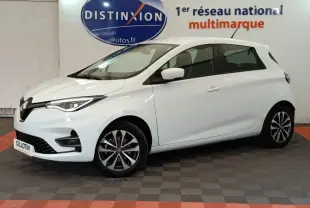 Renault ZOE Intens R110 blanc en vue profil côté gauche, avec jantes alliage et phares LED visibles.