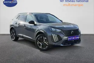 Peugeot e-2008 gris Artense en 3/4 avant droit, SUV électrique avec jantes alu et barres de toit visibles.