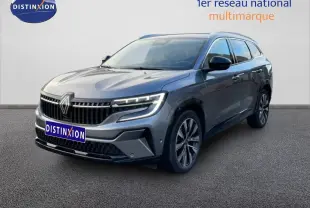 Renault Espace VI E-Tech gris schiste métal en 3/4 avant droit, avec calandre distinctive et jantes alliage.