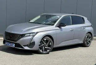 Peugeot 308 Hybrid gris Artense vue 3/4 avant droit, jantes alliage 17'' Halong diamantées et vitres surteintées.