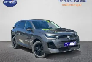 Citroën C5 Aircross gris Platinium vue 3/4 avant avec jantes noires et calandre distinctive.