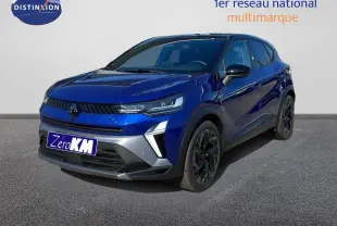 Renault Captur E-Tech hybride 2025 bleu Iron Metal avec toit noir, vue 3/4 avant droit mettant en valeur ses jantes noires.