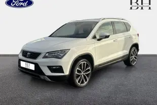 SEAT Ateca blanc Nevada métal vu en 3/4 avant droit, avec jantes alliage distinctives et calandre noire.