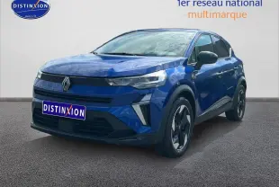Renault Captur 2025 Bleu Iron en 3/4 avant droit avec phares LED et jantes alliage distinctives.
