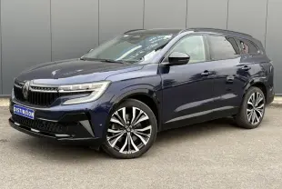 Renault Espace 2023 Bleu Nuit en 3/4 avant droit, avec jantes alliage noires et toit panoramique visible.