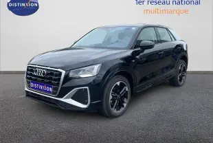 Audi Q2 30 TDI S-Line noir mito metal en 3/4 avant droit, avec jantes biton et calandre chromée distinctive.