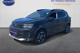 Citroën C5 Aircross noir métal en 3/4 avant droit, mettant en valeur ses jantes distinctives et sa silhouette SUV.