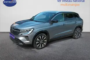 Renault Austral gris schiste métal en 3/4 avant droit, SUV hybride essence avec jantes alliage bicolores.